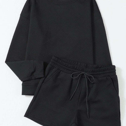 Sophisticated Black Textured Lounge Set with Long Sleeve Top and Adjustable Shorts - Très Elite