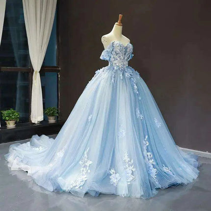 Stunning Off-The-Shoulder Cerulean Quinceanera Ball Gown with Graceful Lace Details and Dramatic Train - Très Elite
