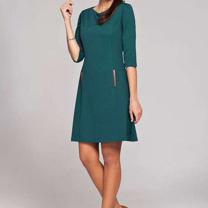 Sustainable Chic Trapeze Dress with Stylish Leather Pocket - Très Elite