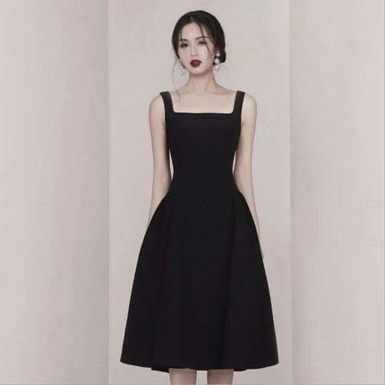Timeless Elegance Black Silk Midi Dress - Classic Audrey Hepburn Inspired Gown - Très Elite
