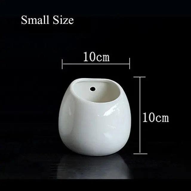 Tranquil Haven Ceramic Plant Hanger: Infuse Your Home with Greenery - Très Elite