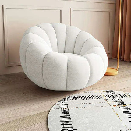 Transformative Rotating Pumpkin Plush Lounge Chair - Chic Seating Solution for Contemporary Interiors - Très Elite