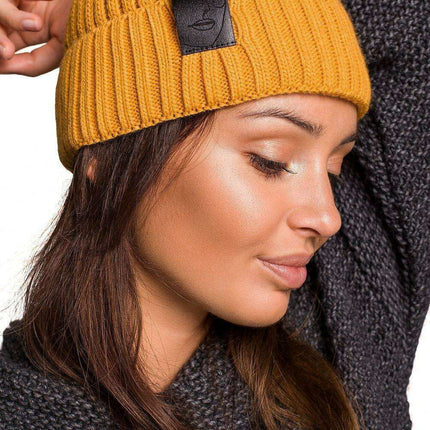 Trendy Acrylic Knit Beanie with Stylish Faux-Leather Face Detail - Très Elite