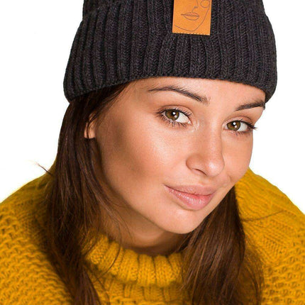 Trendy Acrylic Knit Beanie with Stylish Faux-Leather Face Detail - Très Elite