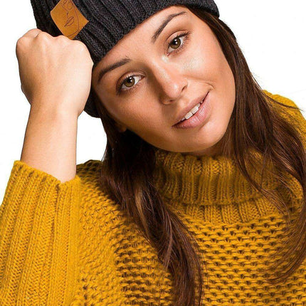 Trendy Acrylic Knit Beanie with Stylish Faux-Leather Face Detail - Très Elite