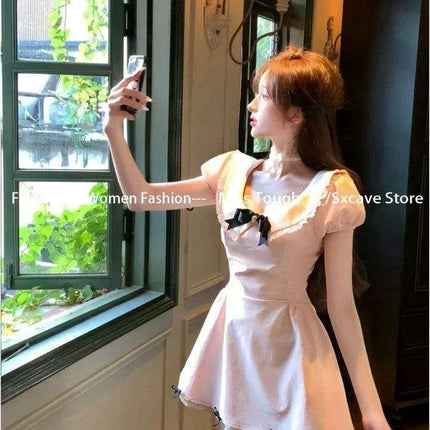 Trendy Retro Short Sleeve Pink Mini Dress for the Fashion-Forward Woman - Très Elite