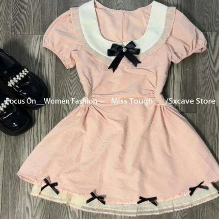 Trendy Retro Short Sleeve Pink Mini Dress for the Fashion-Forward Woman - Très Elite
