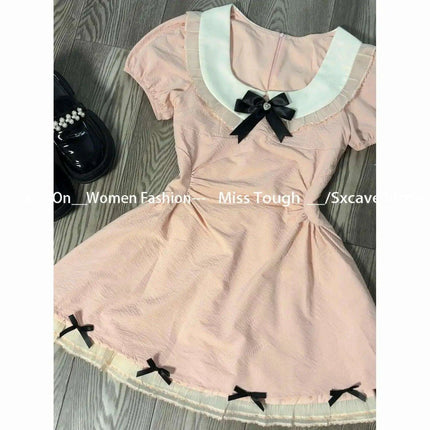 Trendy Retro Short Sleeve Pink Mini Dress for the Fashion-Forward Woman - Très Elite