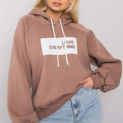 Trendy Women's Hooded Sweatshirt with Front Graphic - Très Elite