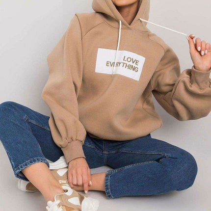 Trendy Women's Hooded Sweatshirt with Front Graphic - Très Elite