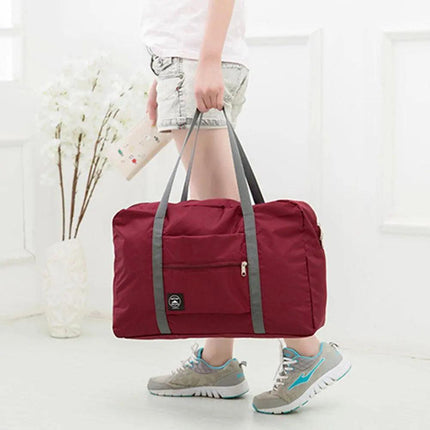 Versatile Waterproof Travel Duffel Bag with Foldable Design..