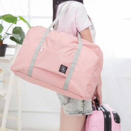 Versatile Waterproof Travel Duffel Bag with Foldable Design..