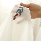 Embroidered blue flowers