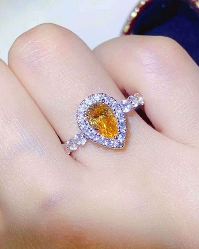 Timeless Teardrop Moissanite Ring with Sparkling Zircon Accents - A Blend of Elegance and Craftsmanship