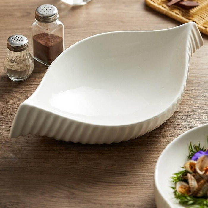Artistic Ceramic Conch-Shaped Plate for Elevated Dining