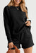 Sophisticated Black Textured Lounge Set with Long Sleeve Top and Drawstring Shorts