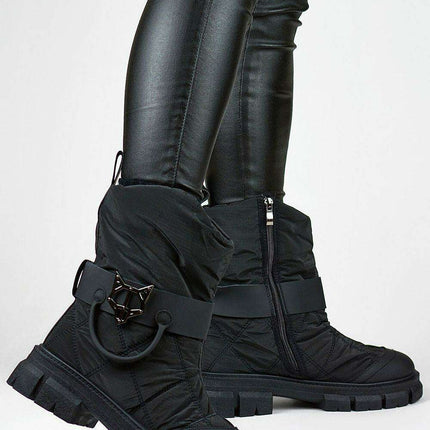 Winter Chic: Sophisticated Black Snow Boots for Cold Weather Style