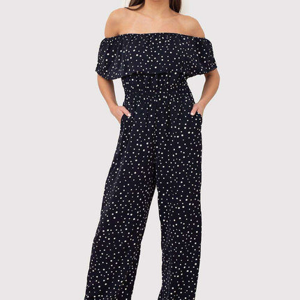 Navy Blue Polka Dot Bardot Jumpsuit with Playful Ruffled Waist