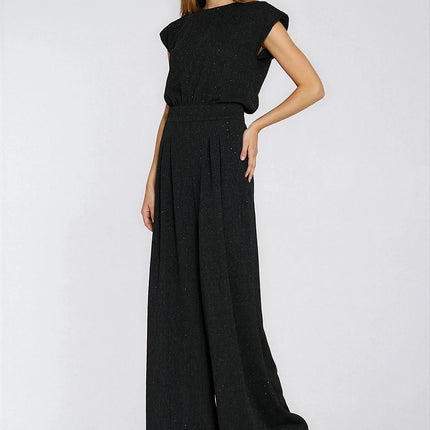 Elegant Black Sequined Knit Jumpsuit Boat Neck Regular Fit Shoulder Pads - Très Elite