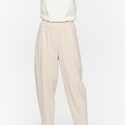 Beige wide-leg cropped pants displayed on a metallic bronze mannequin against a clean white background.