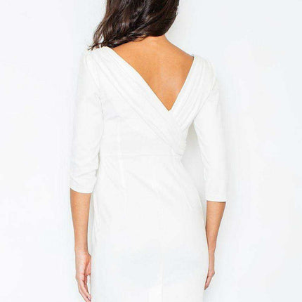 Elegant Cream Dress with Embellished Open Back