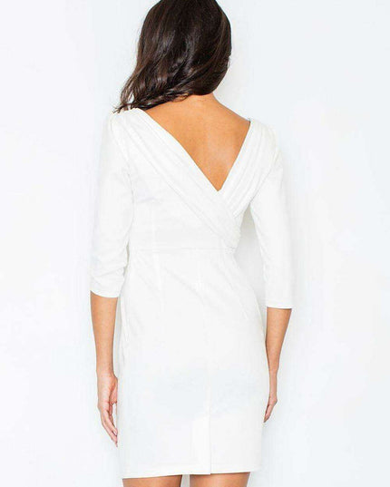Elegant Cream Dress with Embellished Open Back