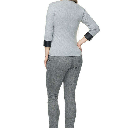 Chic Eco-Leather V-Neck Blouse by PeeKaBoo