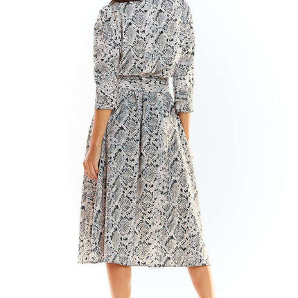 Chic Midi Dress with Stylish Prints and Complementary Waist Belt