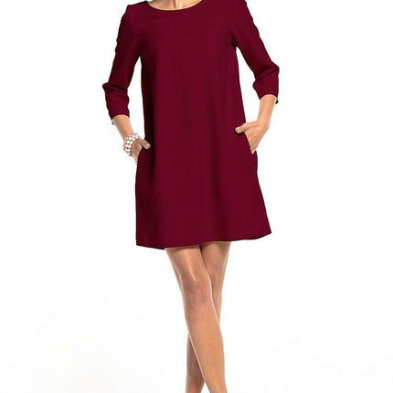 Chic Tessita Daydress: Stylish Pleated Design with Practical Pockets