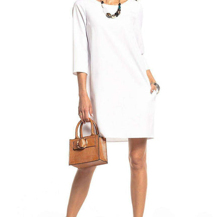 Chic Tessita Daydress: Stylish Pleated Design with Practical Pockets