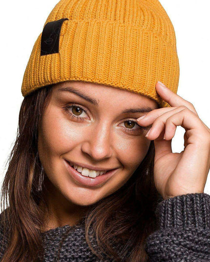 Trendy Acrylic Knit Beanie with Stylish Faux-Leather Face Detail