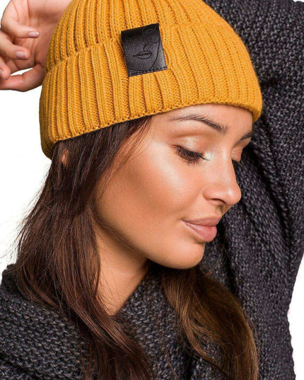 Trendy Acrylic Knit Beanie with Stylish Faux-Leather Face Detail
