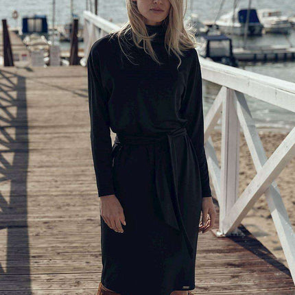 Sophisticated Black Midi Dress with Turtleneck and Flowing Sleeves