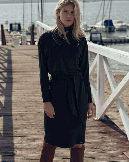 Sophisticated Black Midi Dress with Turtleneck and Flowing Sleeves