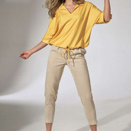 Chic Beige Corduroy Trousers with Elegant Pleats and Tapered Fit