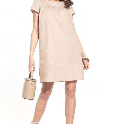 Elegant Cotton Mini Dress with Boat Neck and Trendy Details