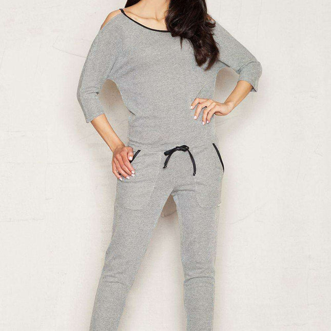 Sleek Charcoal Utility Jumpsuit with Trendy Patch Pockets and Elegant Black Details