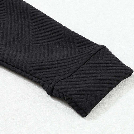 Sophisticated Black Textured Lounge Set with Long Sleeve Top and Adjustable Shorts