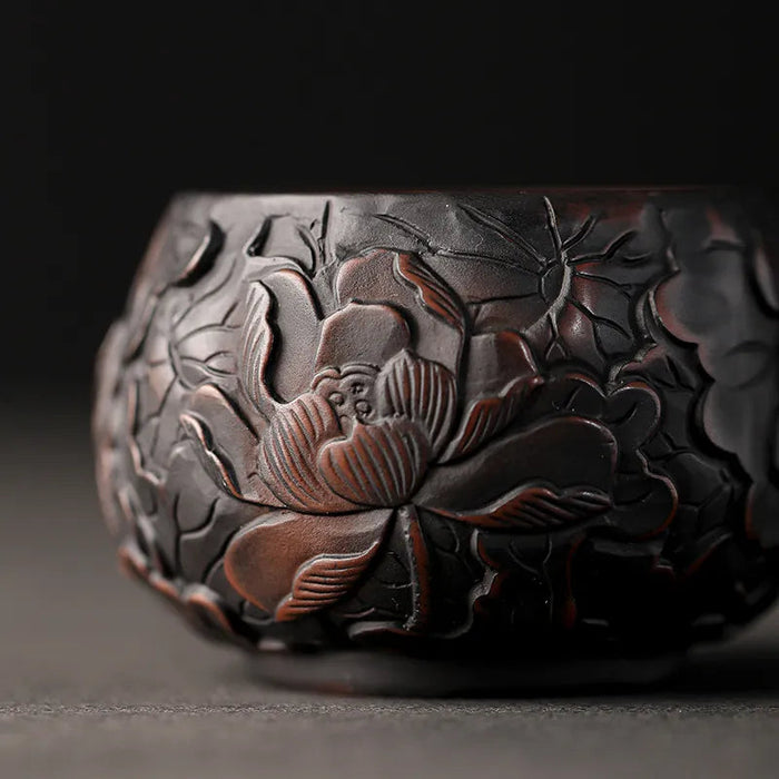 Elegant Handcrafted Purple Pottery Teacup with Lotus Carvings