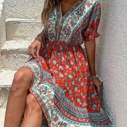Vintage-Inspired Asymmetrical Hem Midi Dress for Tropical Escapes