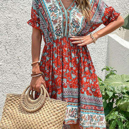 Vintage-Inspired Asymmetrical Hem Midi Dress for Tropical Escapes