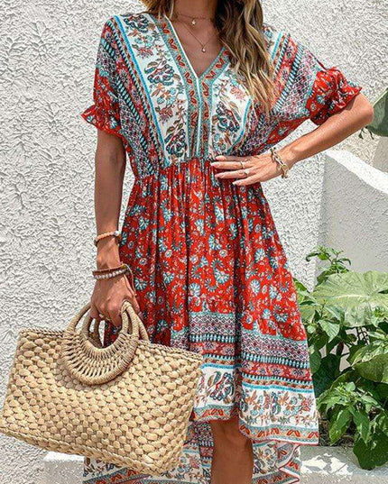 Vintage-Inspired Asymmetrical Hem Midi Dress for Tropical Escapes