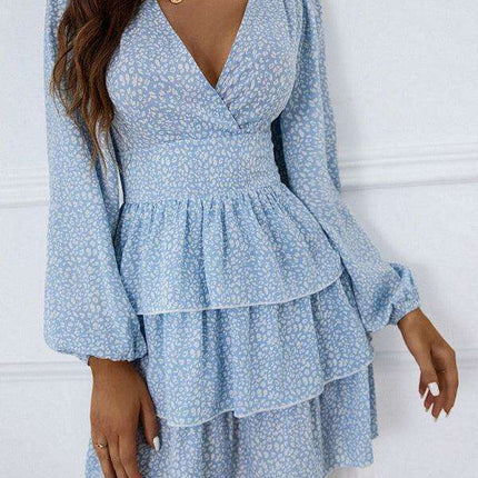 Charming Polka Dot V-Neck Dress with Puff Sleeves and Waist-Defining Style