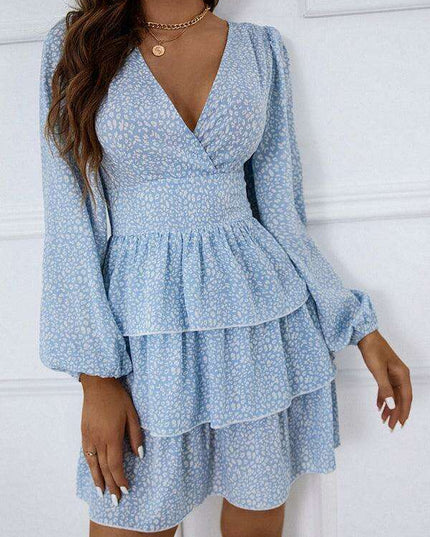 Charming Polka Dot V-Neck Dress with Puff Sleeves and Waist-Defining Style