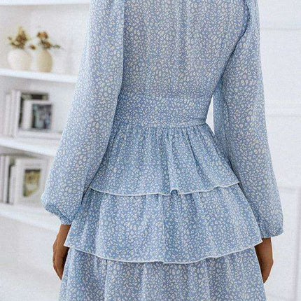 Charming Polka Dot V-Neck Dress with Puff Sleeves and Waist-Defining Style