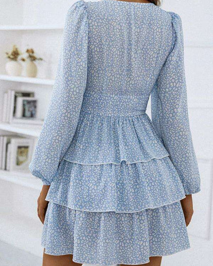 Charming Polka Dot V-Neck Dress with Puff Sleeves and Waist-Defining Style