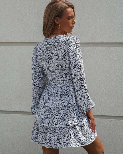 Charming Polka Dot V-Neck Dress with Puff Sleeves and Waist-Defining Style
