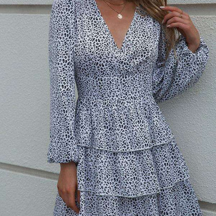 Charming Polka Dot V-Neck Dress with Puff Sleeves and Waist-Defining Style