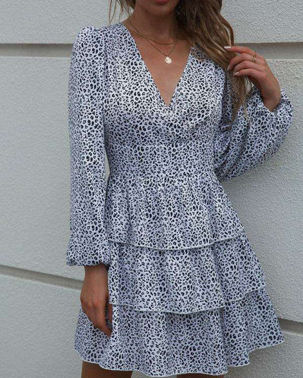 Charming Polka Dot V-Neck Dress with Puff Sleeves and Waist-Defining Style