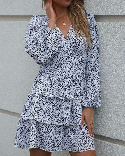 Charming Polka Dot V-Neck Dress with Puff Sleeves and Waist-Defining Style